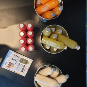 antidote juice bottles displayed on a table